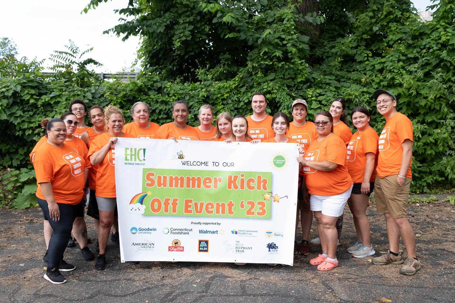 staff, interns and volunteers pose for a group photo